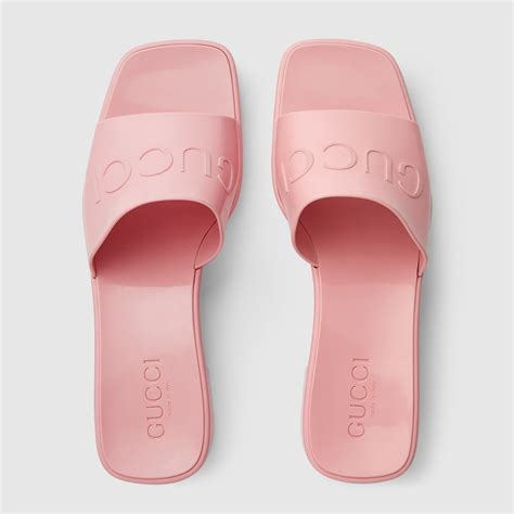 gucci pink rubber slide sandals.